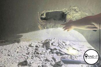 Vermiste katjie toe al die tyd agter muur vasgemessel