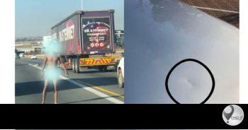 Man hardloop kaal op N1 tydens spitsverkeer