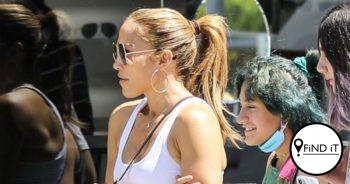 Jennifer Lopez showcases her taut tummy in a sexy cropped tank