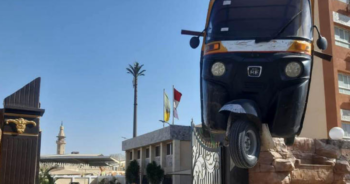 Egyptian authorities execute illegal Tuk Tuk by hanging it in street
