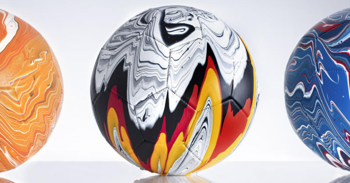 Artist's fusion paint-pouring project turns national football strips into colourful marbled balls
