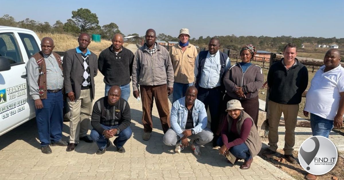 Beefmaster Group's supply chain executive Roelie van Reenen, Transkei Feed Kraal project manager Thabo Mgandana, and various other stakeholders celebrate the progress of the Transkei Feed Kraal in Centane.