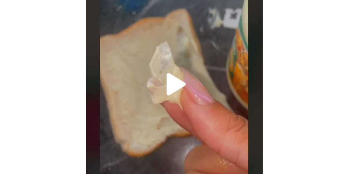 Vrou kry glasstukke in mayonnaise