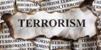 Beskuldigdes in Julie-onrus kan aangekla word van terrorisme